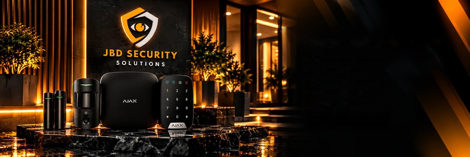 Ajax hub, camera detector, keypad and door contacts in front of the illuminated JBD Security Solutions sign